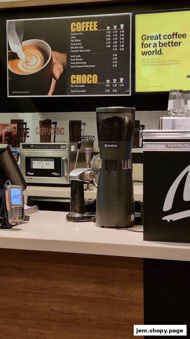 A menu board displaying coffee and chocolate drinks with prices.