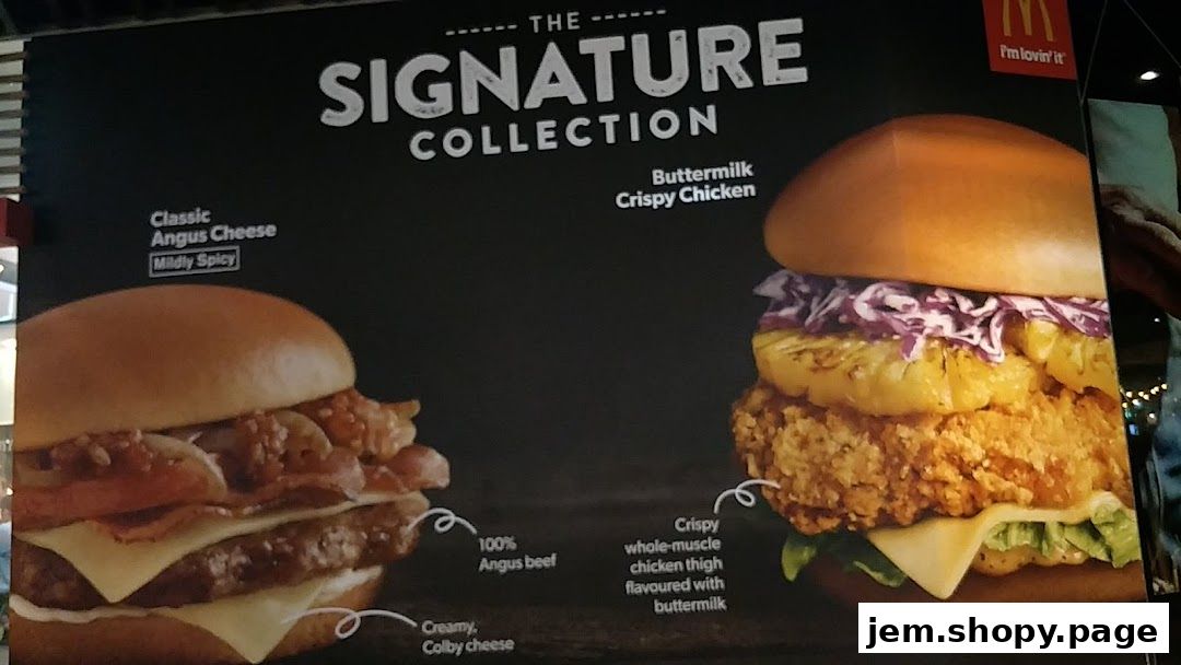 McDonald's Signature Collection burgers: Classic Angus Cheese and Buttermilk Crispy Chicken.