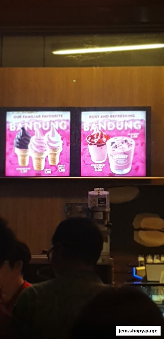 McDonald's menu board displaying Bandung ice cream treats and prices.