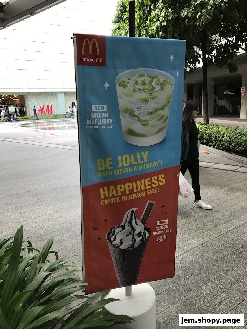 A McDonald's promotional banner advertising new McFlurry and Choco Jumbo Cone.