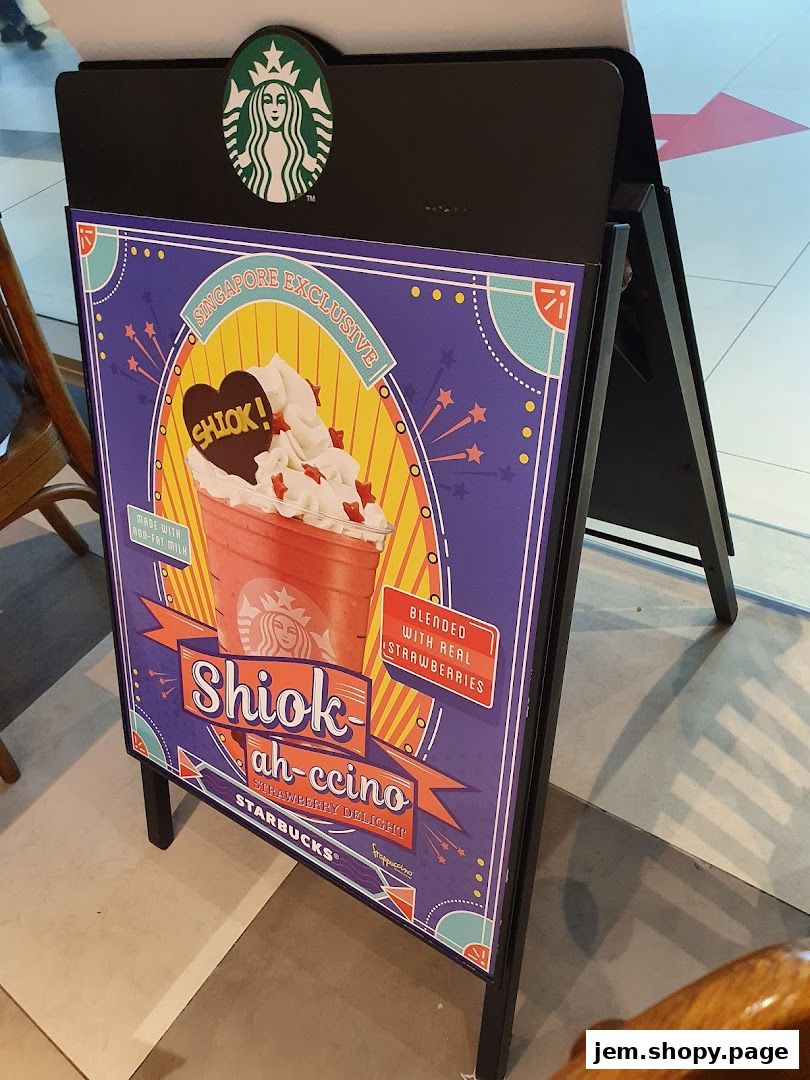 A Starbucks A-frame sign advertises a Singapore exclusive drink called 'Shiok ah-ccino'.