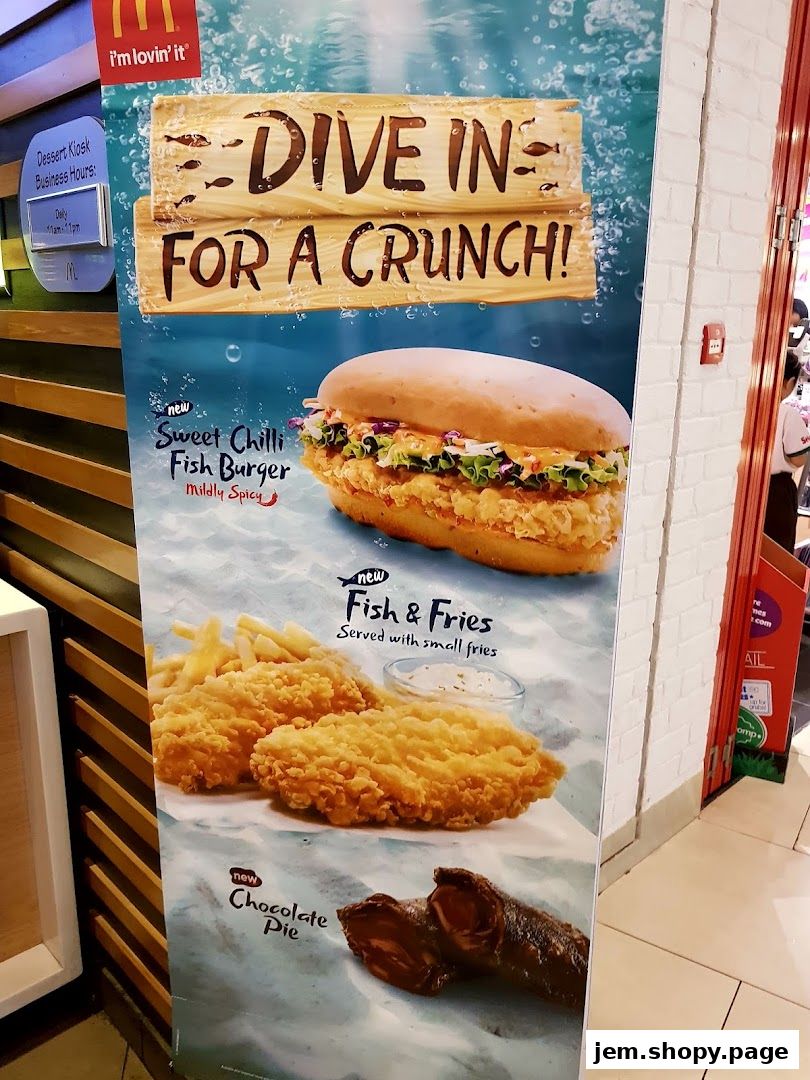 A promotional poster for McDonald's featuring new fish burger, fish and fries, and chocolate pie.