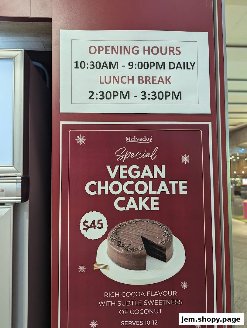 A sign advertising Melvados' special vegan chocolate cake with its price and serving size.