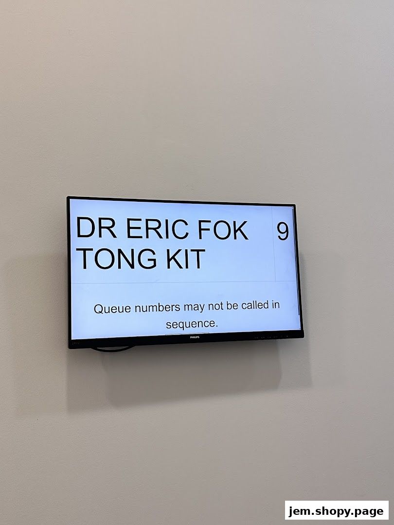 A digital display shows doctor's name, queue number, and a message about sequence.