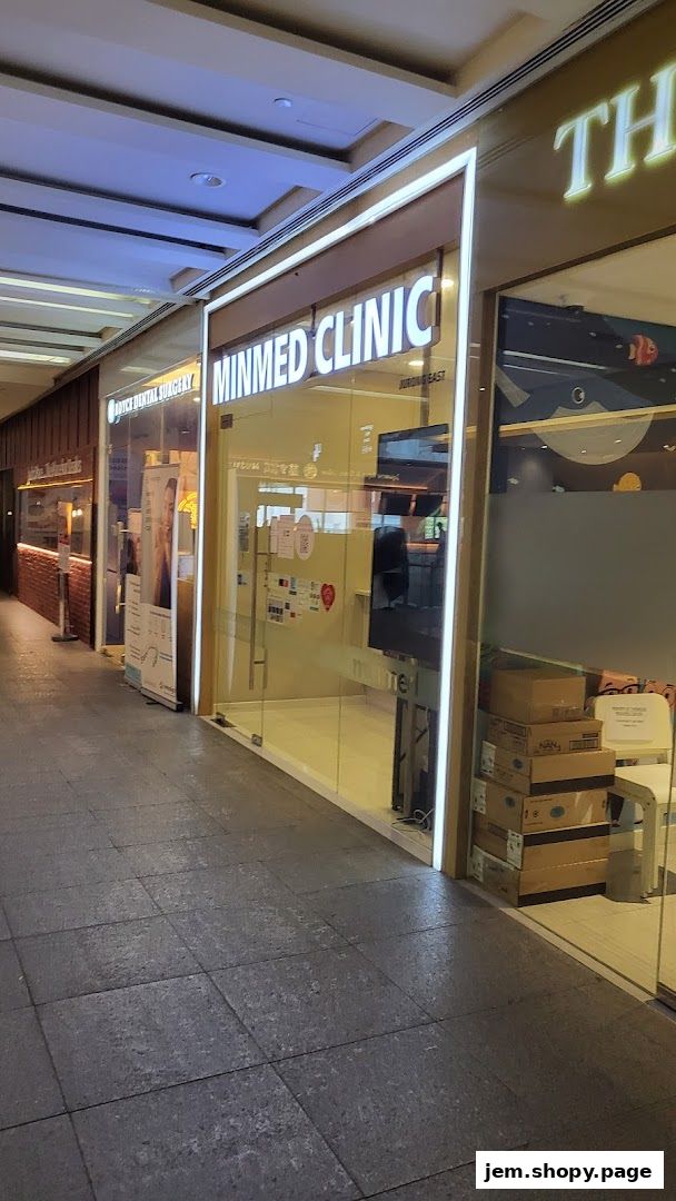 The exterior of Minmed Clinic Jurong East, a medical clinic with a glass storefront.