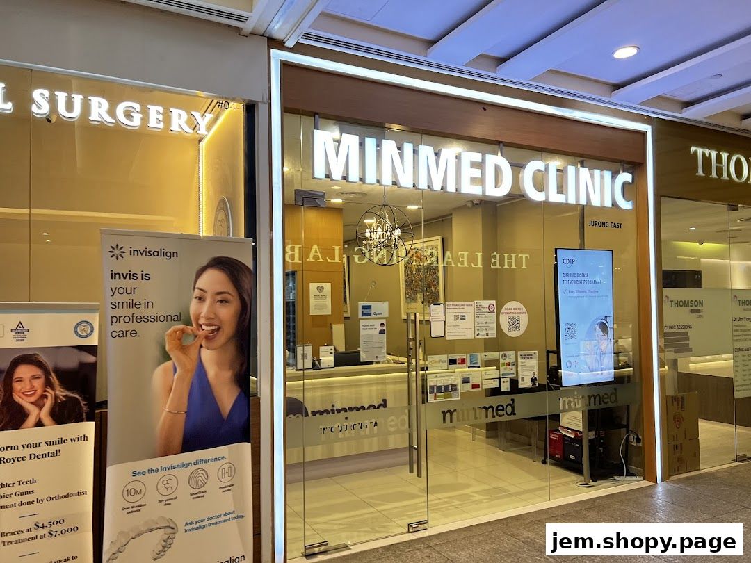 The exterior of Minmed Clinic Jurong East, a medical clinic, with promotional banners outside.