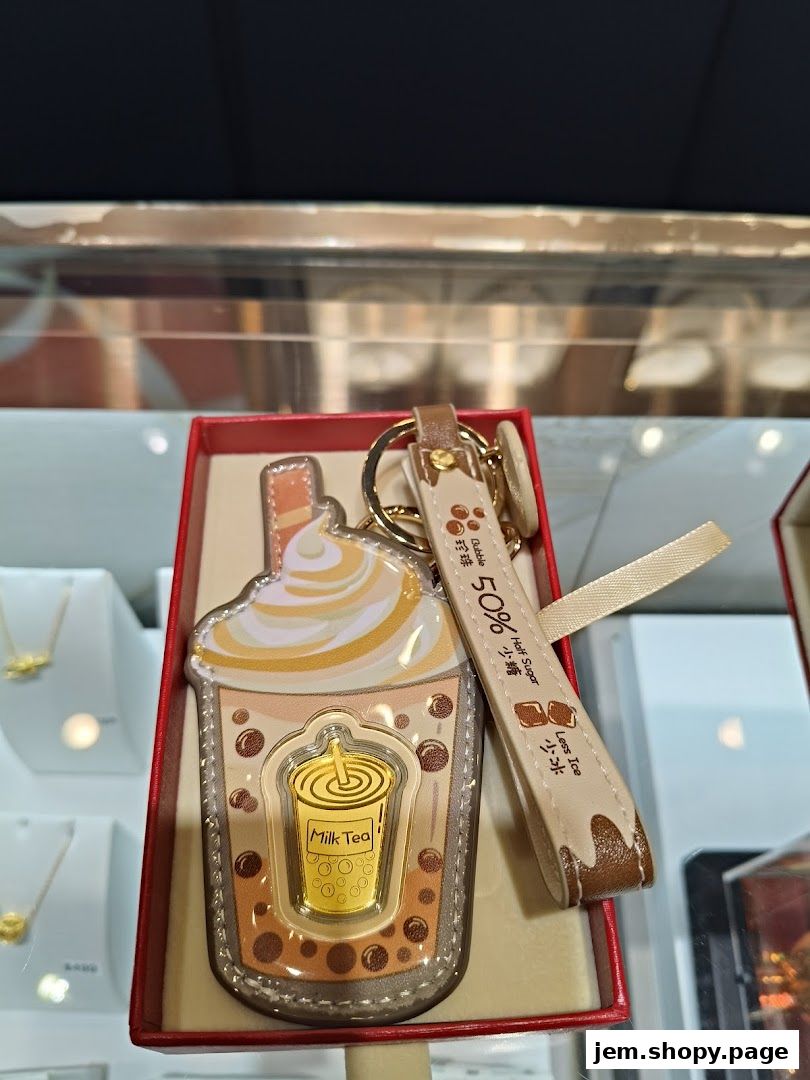 A bubble tea keychain with 'Milk Tea' text and customization options.