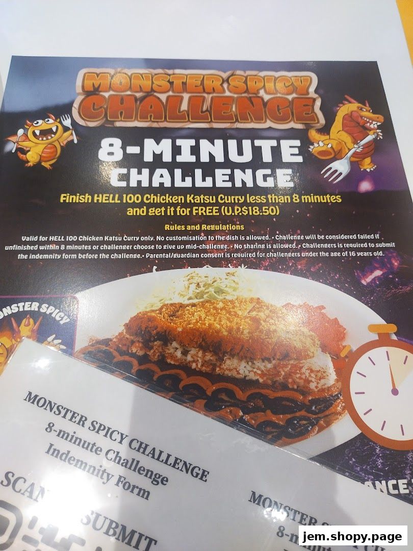 A promotional flyer for the 'Monster Spicy Challenge' featuring a spicy curry dish.