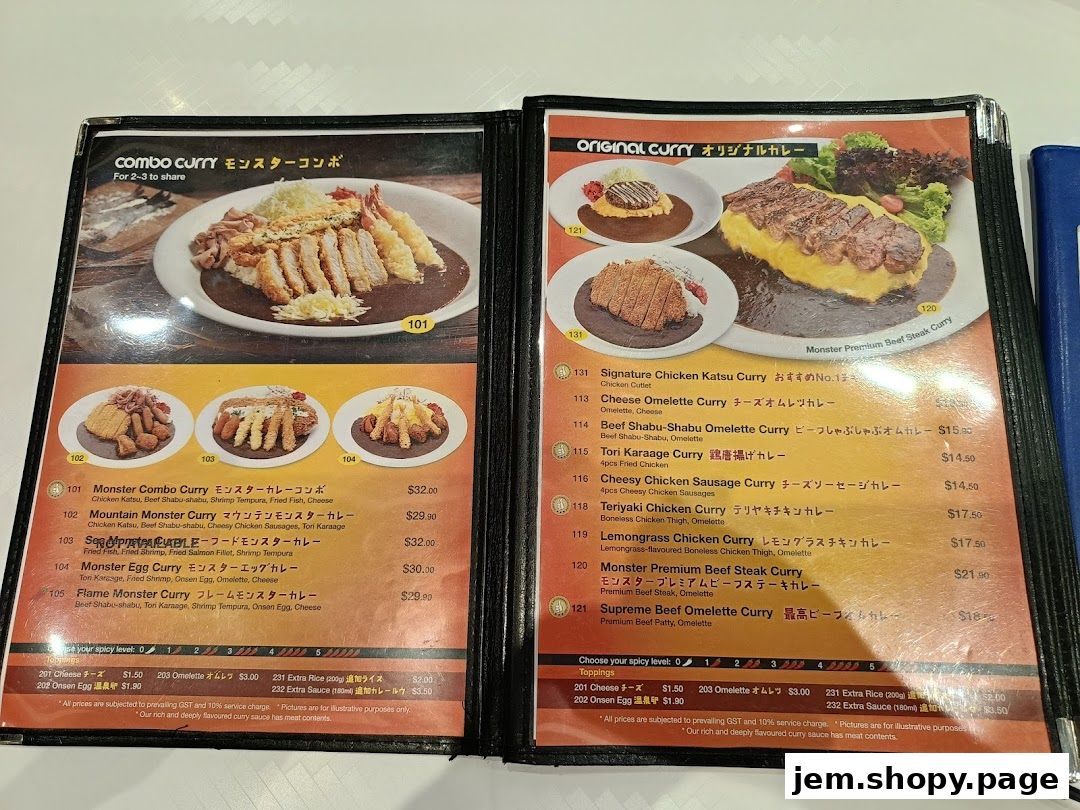 A menu from Monster Planet featuring various curry dishes with images and prices.