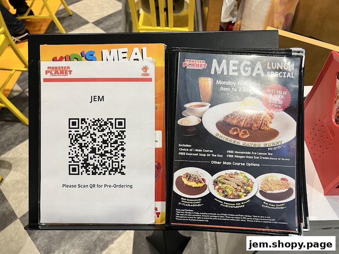 A menu board for Monster Planet featuring a Mega Lunch Special with Chicken Katsu Curry.