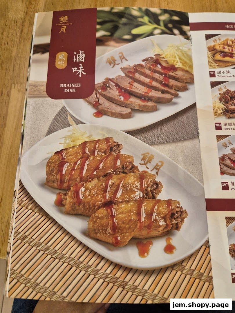 A menu page from Moon Moon Food featuring braised dishes like sliced meat and chicken wings.