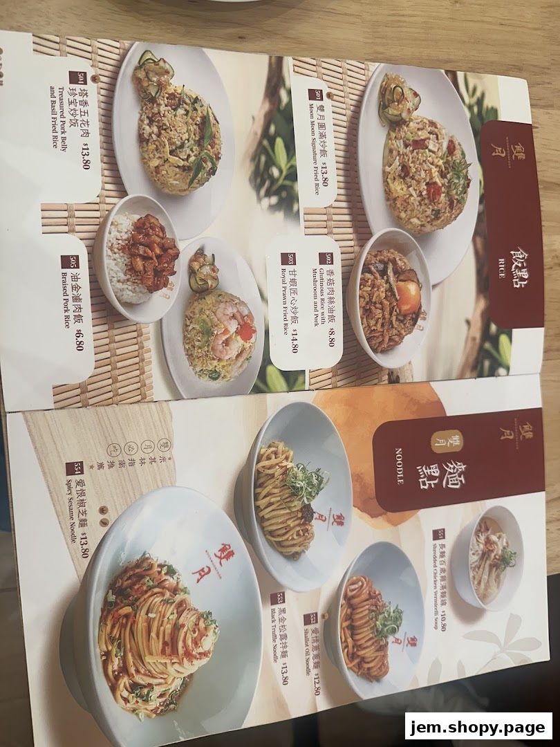 A menu from Moon Moon Food JEM featuring rice and noodle dishes with prices.