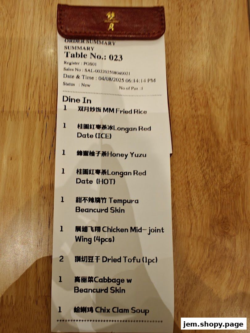 An order summary receipt from Moon Moon Food JEM listing various dishes and drinks.