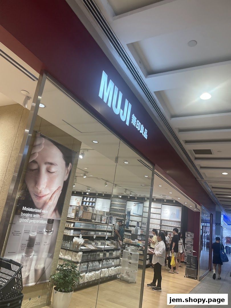 The exterior of the MUJI JEM store, showcasing its minimalist design and product displays.