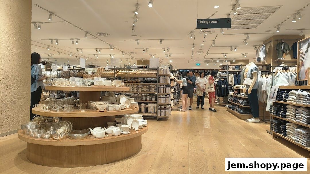 Interior view of MUJI JEM store showcasing homeware and apparel displays.