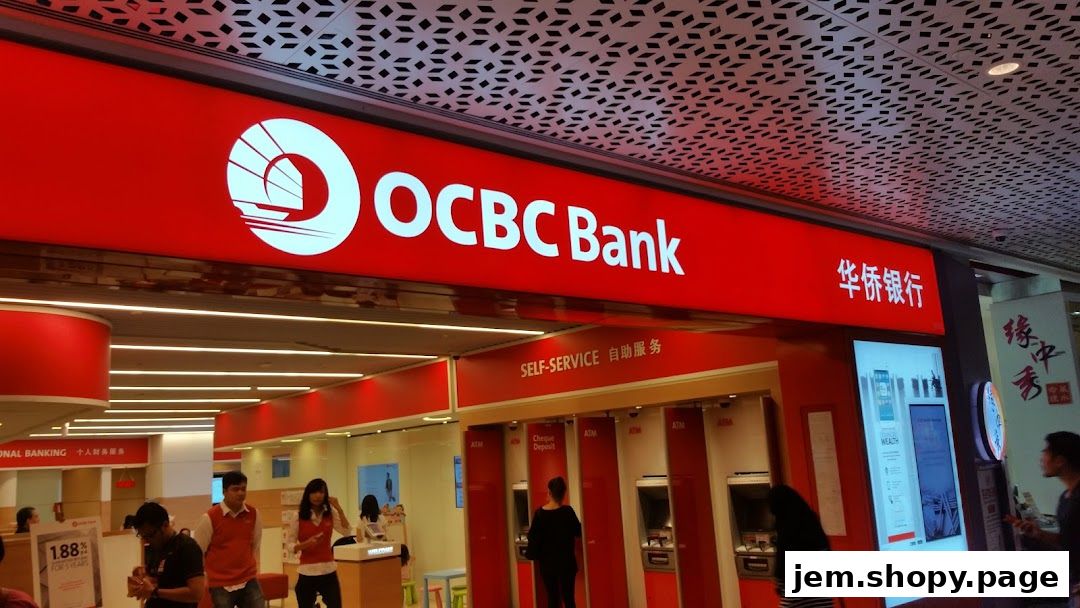The exterior of an OCBC Bank branch with self-service ATMs and staff assisting customers.