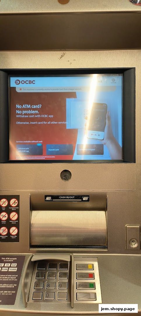 An OCBC ATM screen displays a message about cash withdrawal issues and alternative services.