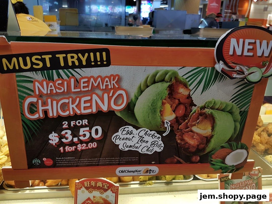 A sign advertising Old Chang Kee's Nasi Lemak Chicken'O with a special offer.
