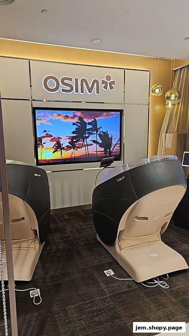 Two OSIM massage chairs are displayed in front of a screen showing a tropical sunset.