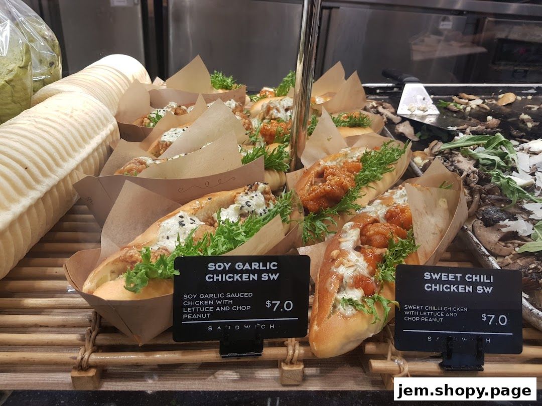 A display of freshly made sandwiches with various fillings and toppings.