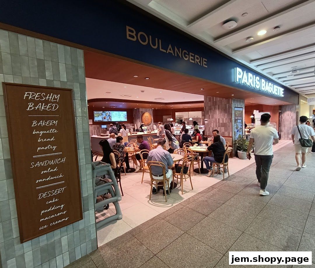 Paris Baguette Boulangerie with customers seated and walking by.