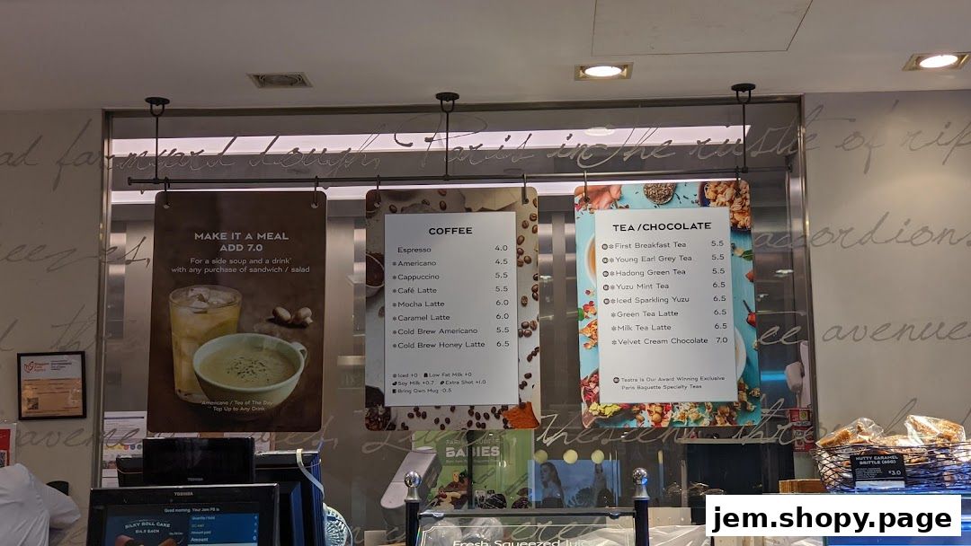 Paris Baguette Jem displays menus for coffee, tea, and chocolate drinks, along with a meal deal.