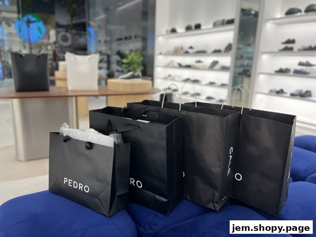 PEDRO shopping bags displayed on a blue surface with shoes on shelves in the background.