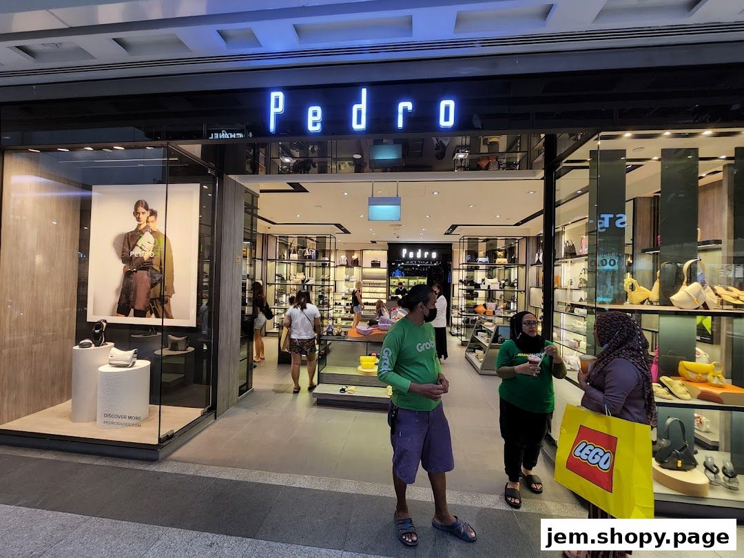 The Pedro Jem shoe store entrance with a display window and interior view.