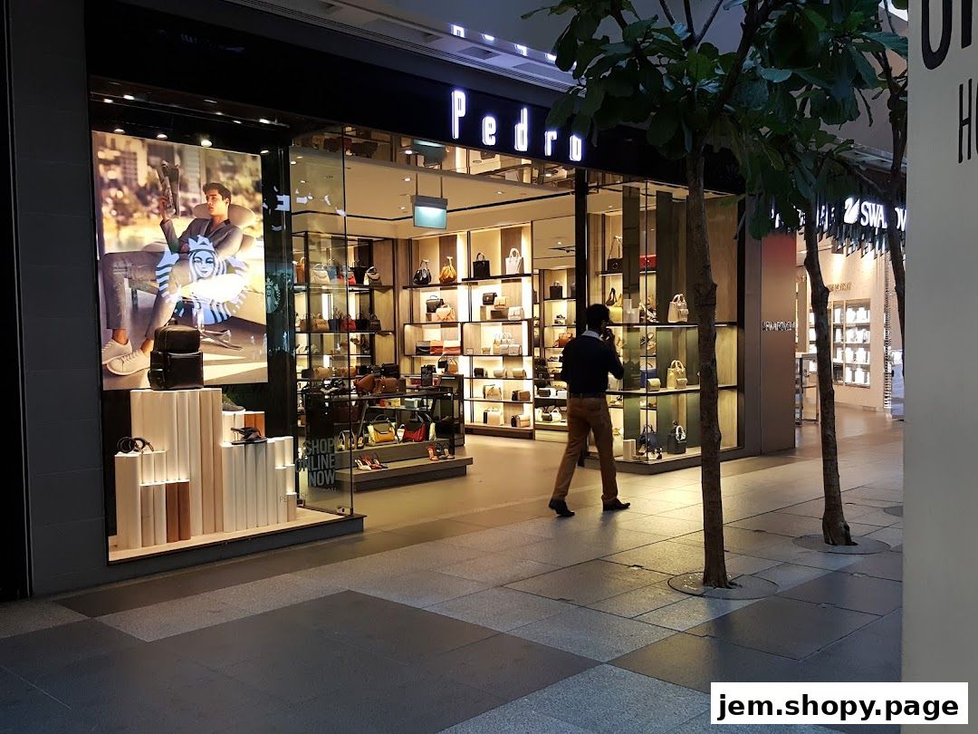 The Pedro Jem shop front displays a variety of handbags and shoes in a well-lit interior.