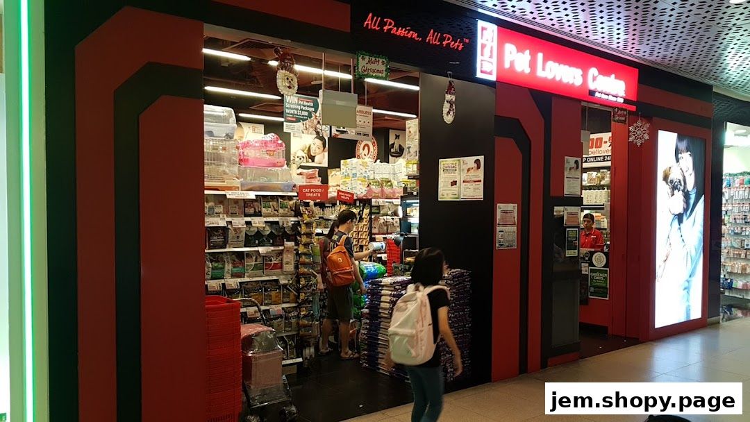 The entrance of Pet Lovers Centre, a pet supply store, with shelves stocked with pet food and treats.