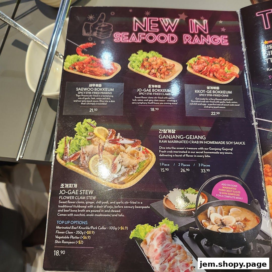 A menu page showcasing Korean seafood dishes with vibrant images and descriptions.