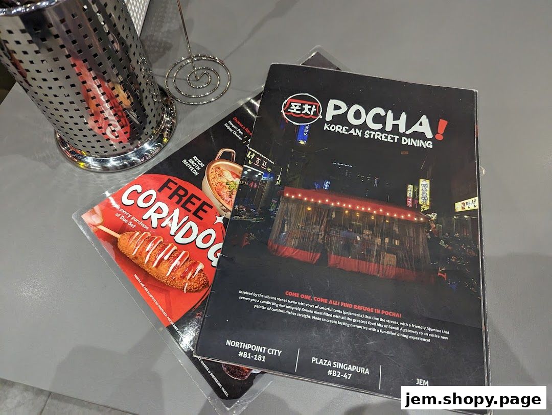 A menu from POCHA! Korean Street Dining featuring a free corndog offer.