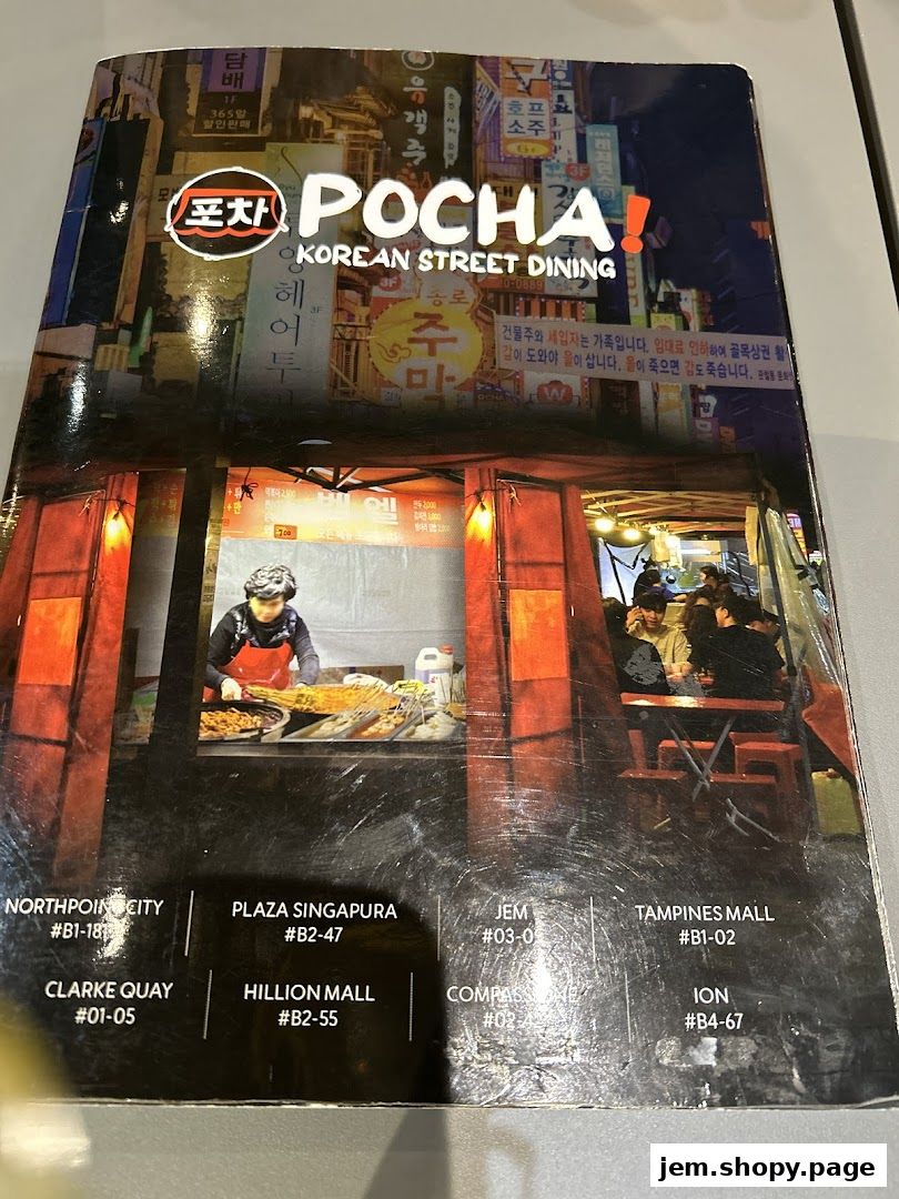 Cover of a menu for POCHA! Korean Street Dining, showcasing street food scenes.