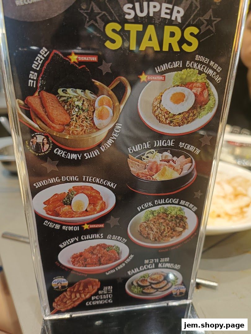 A menu board showcasing various Korean street food dishes with enticing images and names.