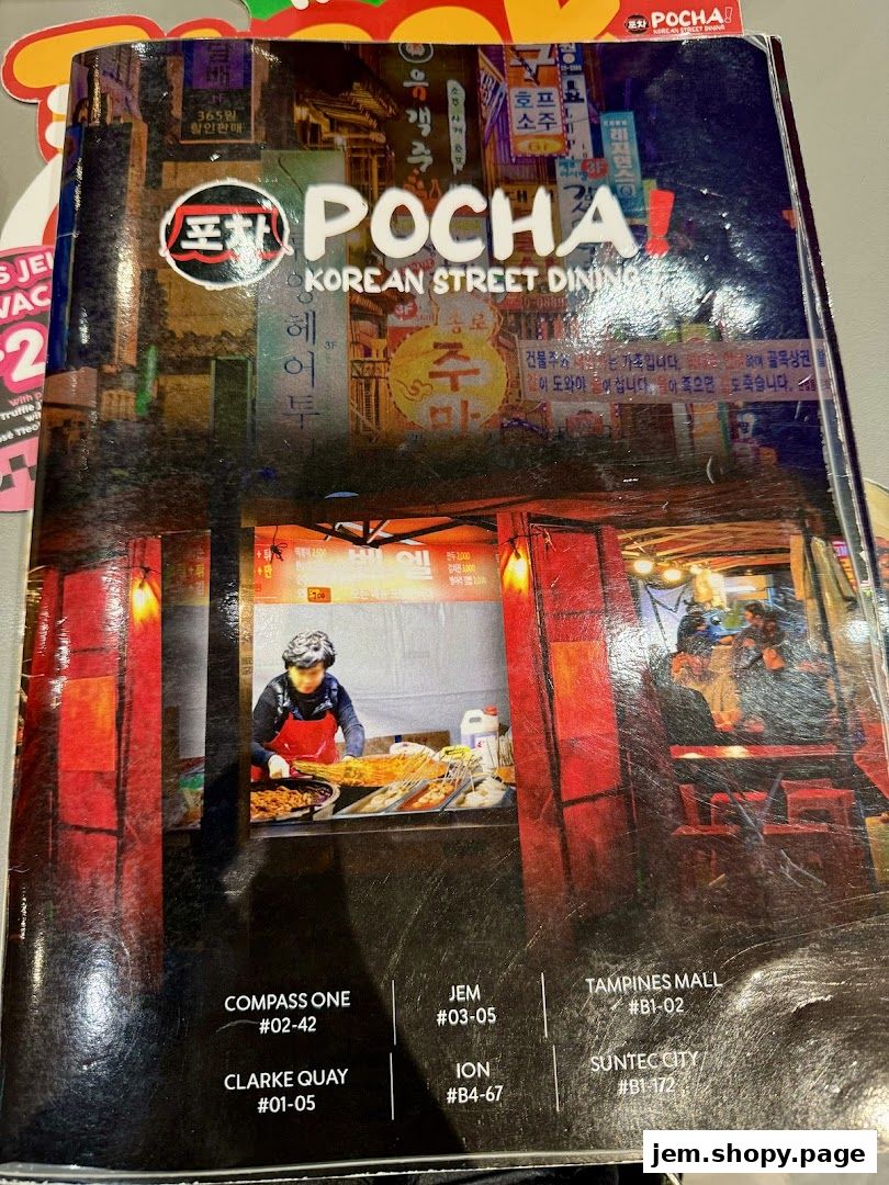 Cover of a menu for POCHA! Korean Street Dining, featuring street scenes and food stalls.