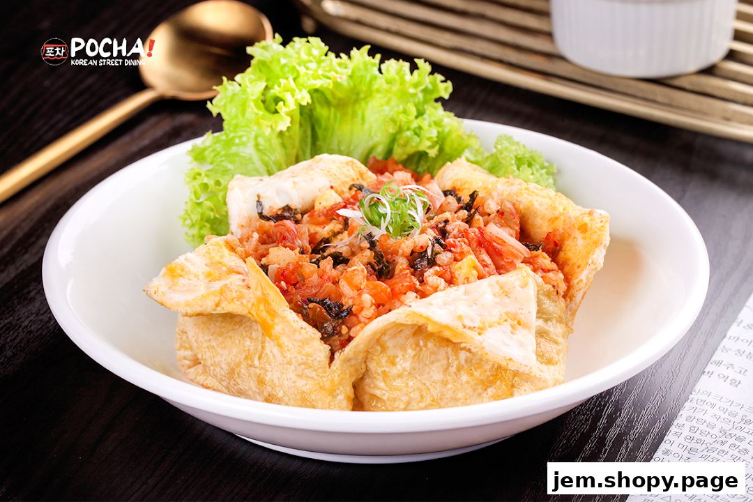 A close-up of a Korean street food dish served in a white bowl with lettuce.