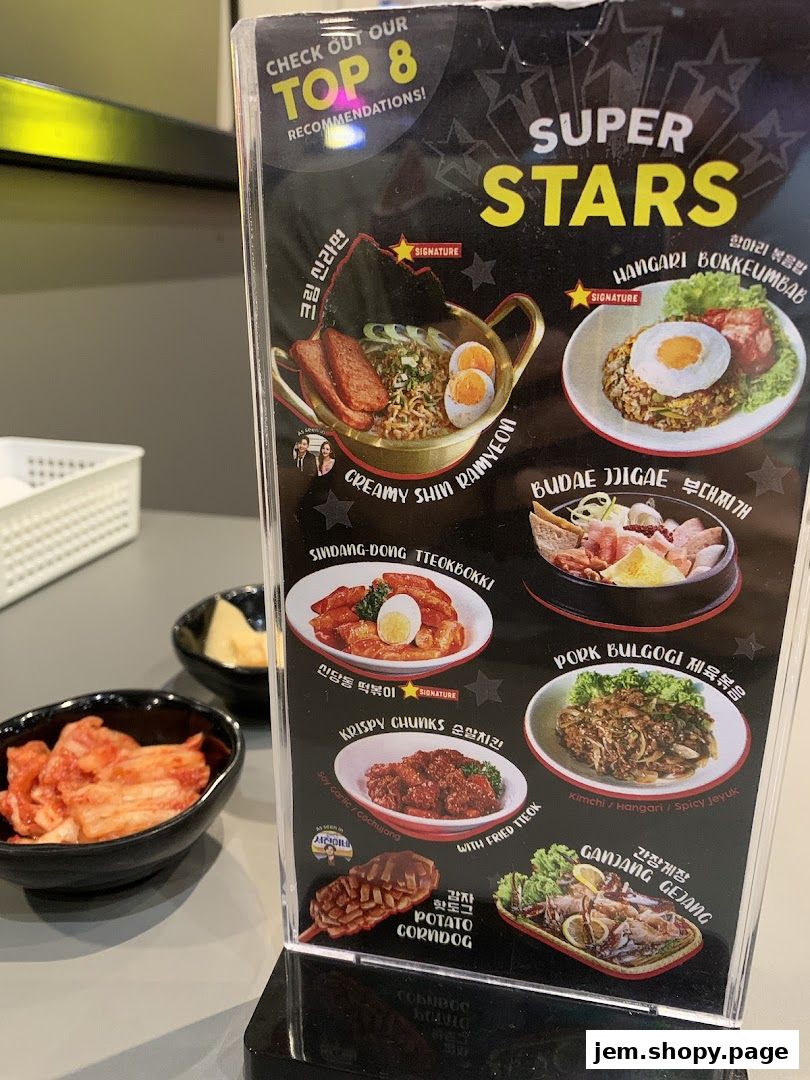 A menu board showcasing popular Korean street food dishes with vibrant images.