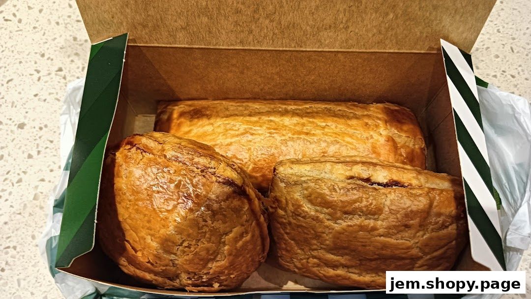 A box of freshly baked pastries from Polar Puffs & Cakes.