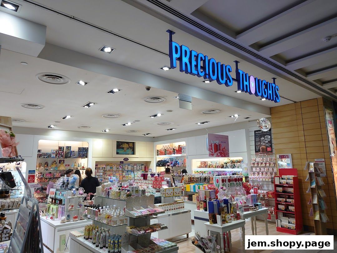 The brightly lit interior of Precious Thoughts JEM, a gift and novelty shop.