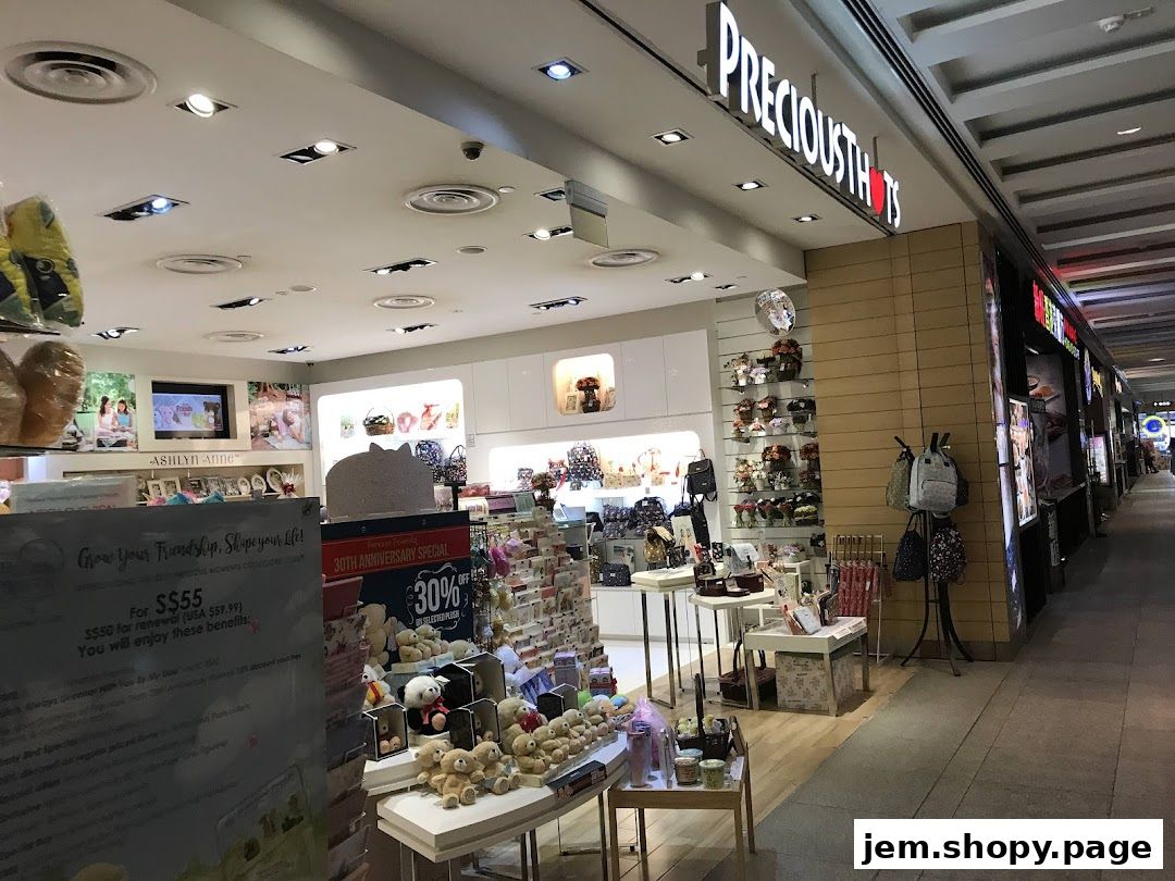 The exterior of the Precious Thoughts JEM shop, showcasing gifts and plush toys.