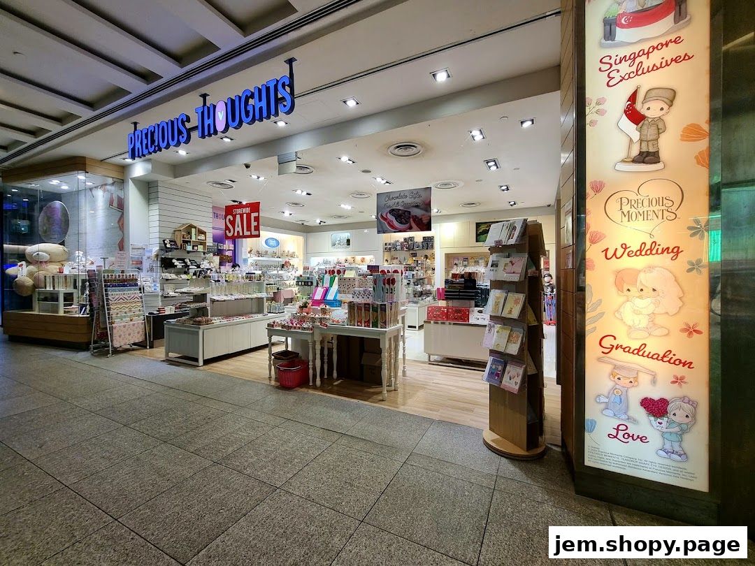 The storefront of Precious Thoughts JEM, featuring gifts, cards, and displays.