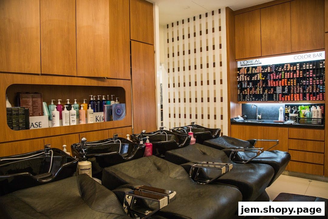 Interior of a hair salon with shampoo chairs, hair products, and a L'Oreal color bar.