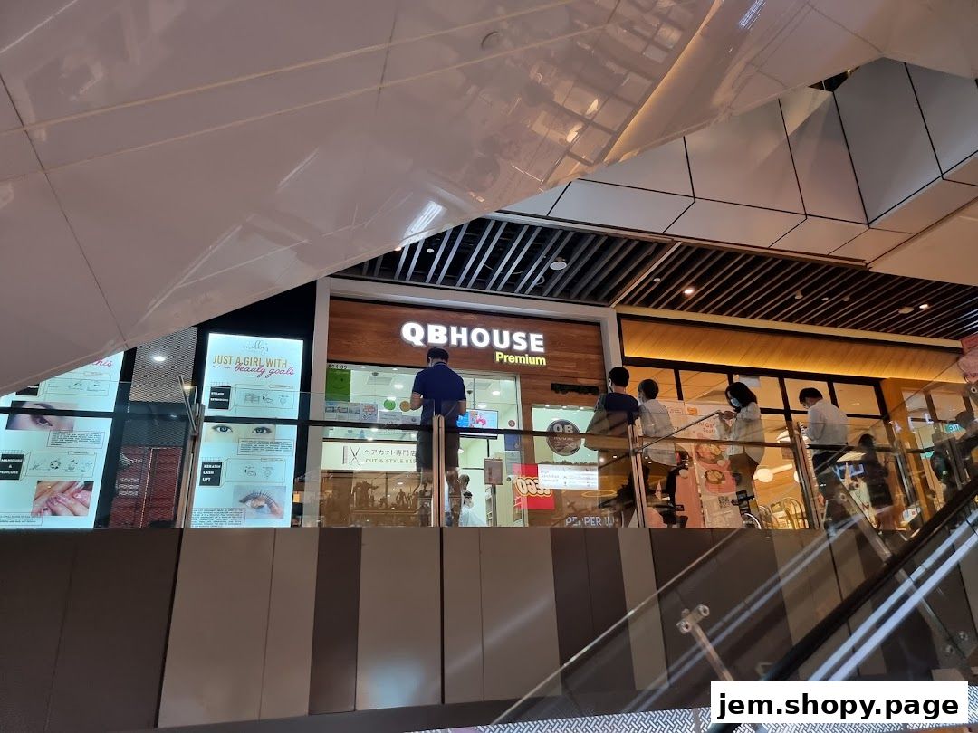 The exterior of QB Premium shop with a display of beauty services and products.