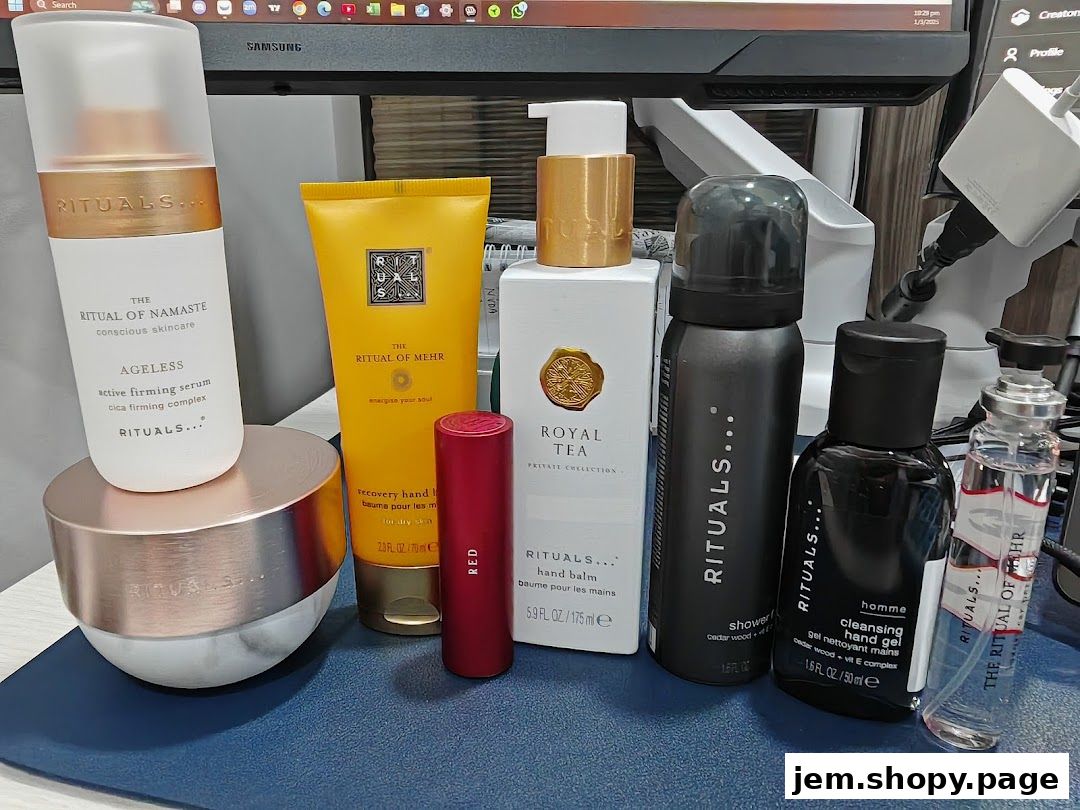 A collection of Rituals skincare and personal care products displayed on a desk.