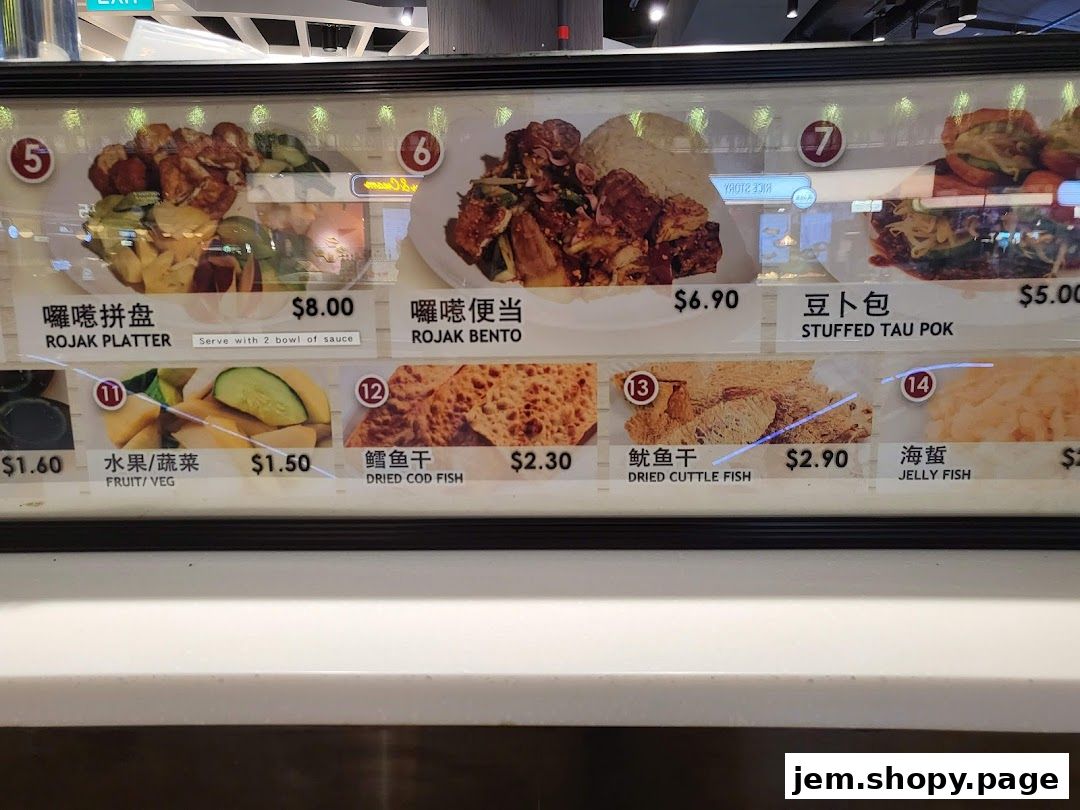 A display of various Rojak dishes and side items with prices.