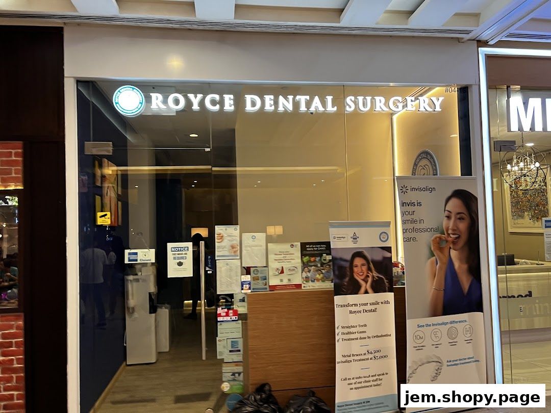 The exterior of Royce Dental Surgery, featuring its signage and promotional banners.