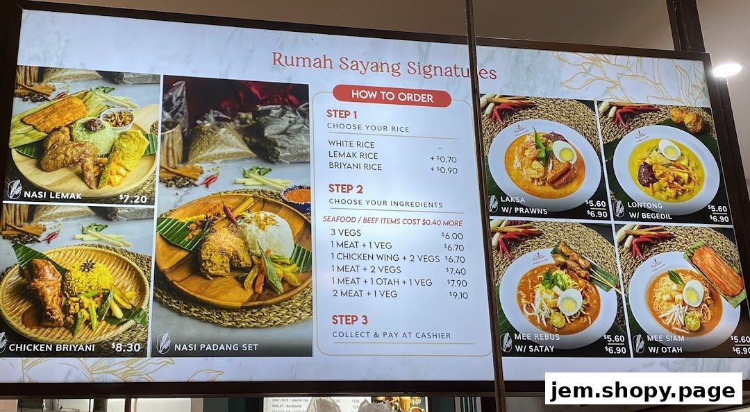 A menu board for Rumah Sayang featuring signature dishes like Nasi Lemak and Laksa.