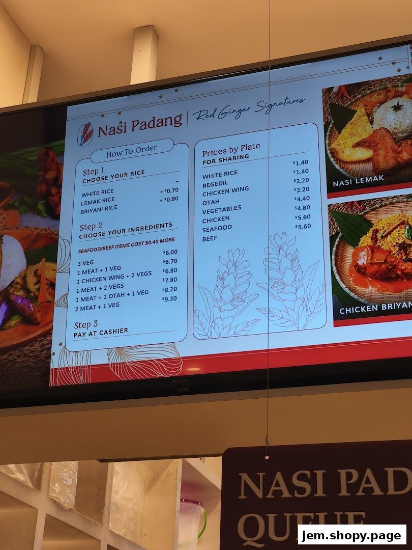 A digital menu board displaying Nasi Padang dishes and prices.