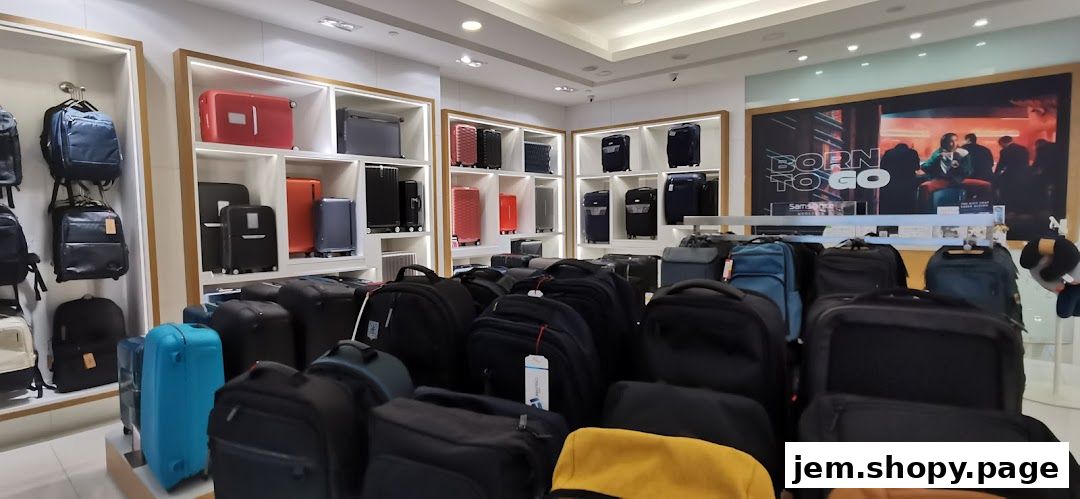 Interior view of a Samsonite store showcasing a wide variety of luggage and backpacks.