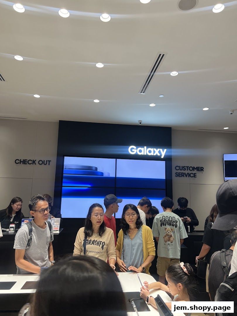 People browsing in a Samsung Experience Store with a Galaxy display.
